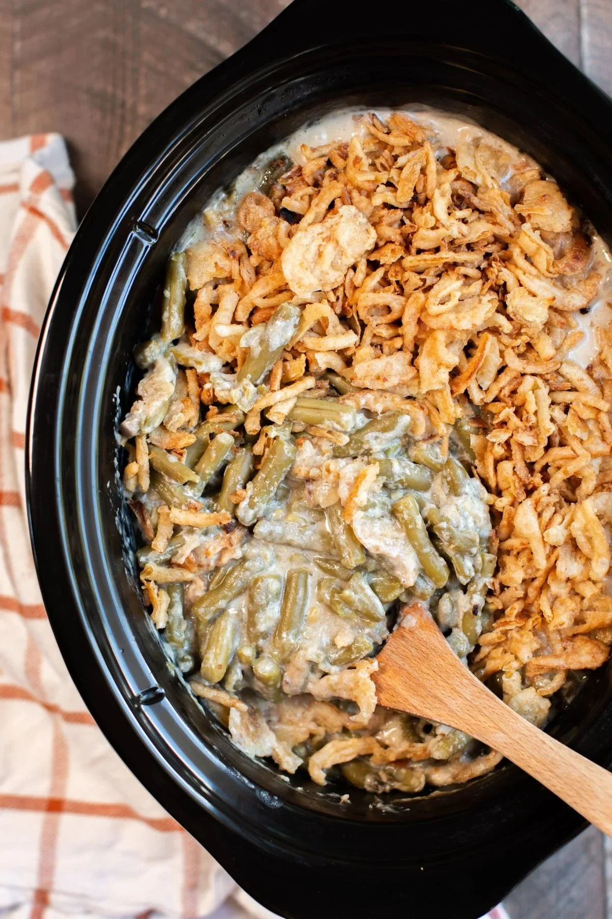 Slow cooker green bean casserole with crispy onions on top